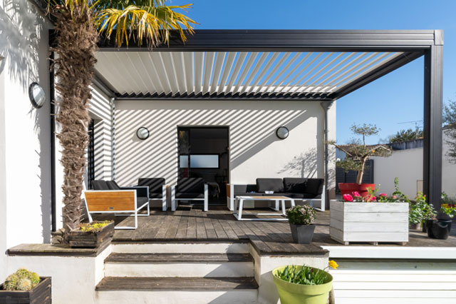 La terrasse couverte : idées d’aménagement pour un espace extérieur confortable !